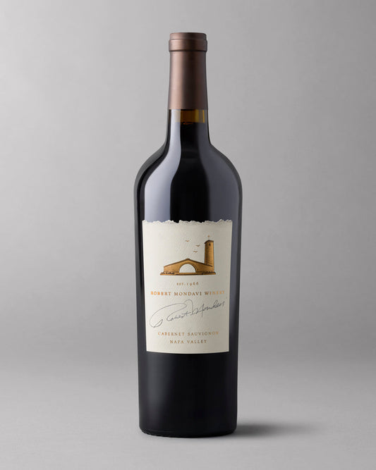 A bottle of Napa Valley Cabernet Sauvignon on a grey background