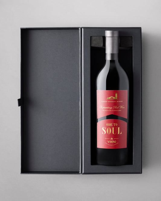 A bottle of 2021 Ode to Soul Proprietary Red Wine on a grey background.
