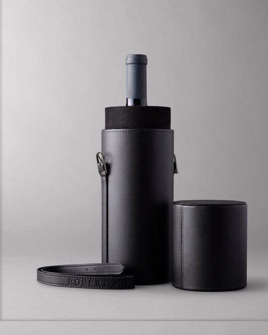 Single Bottle Wine Carrier made from vegan leather, with the Arch & Tower embossed on the cap
