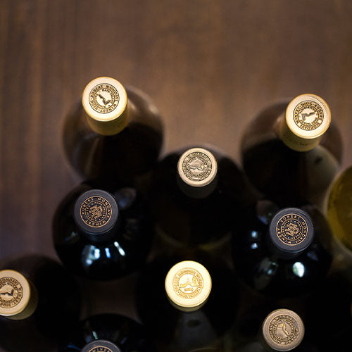 Top down view of marks on wine bottle caps