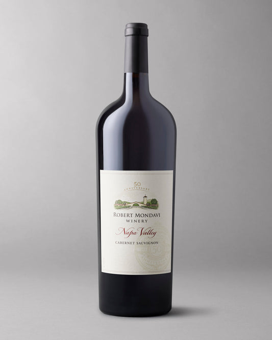 A bottle of 2019 Cabernet Sauvignon Napa Valley 1.5L on a grey background.