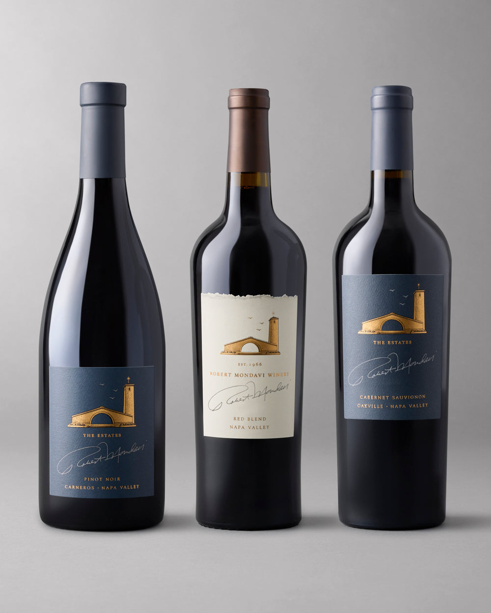 A bottle of  Estates Cabernet Sauvignon, Estates Carneros Pinot Noir and  Napa Valley Red Blend