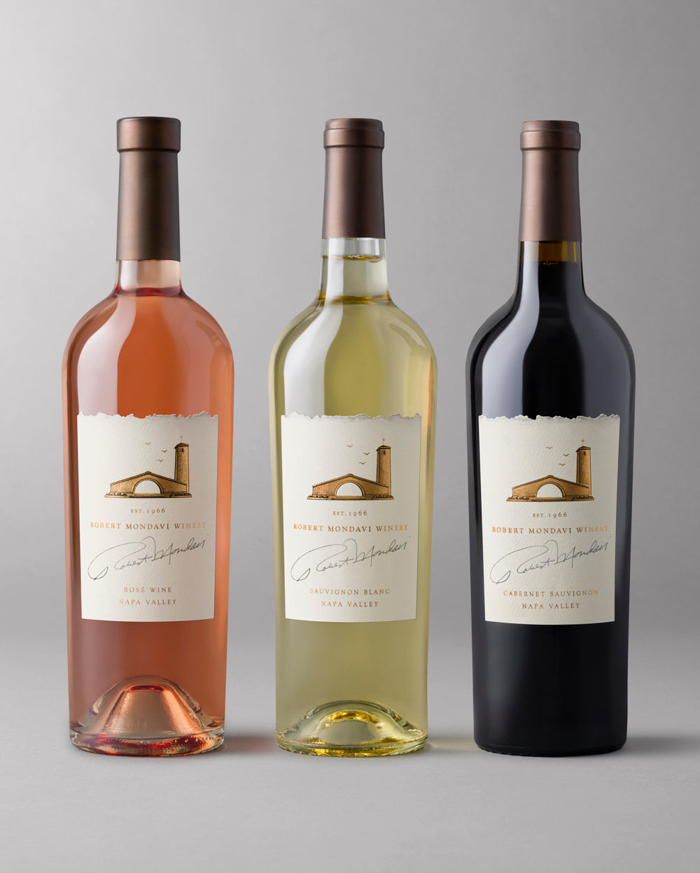 A bottle of each Napa Valley Cabernet Sauvignon, Chardonnay, and Rose