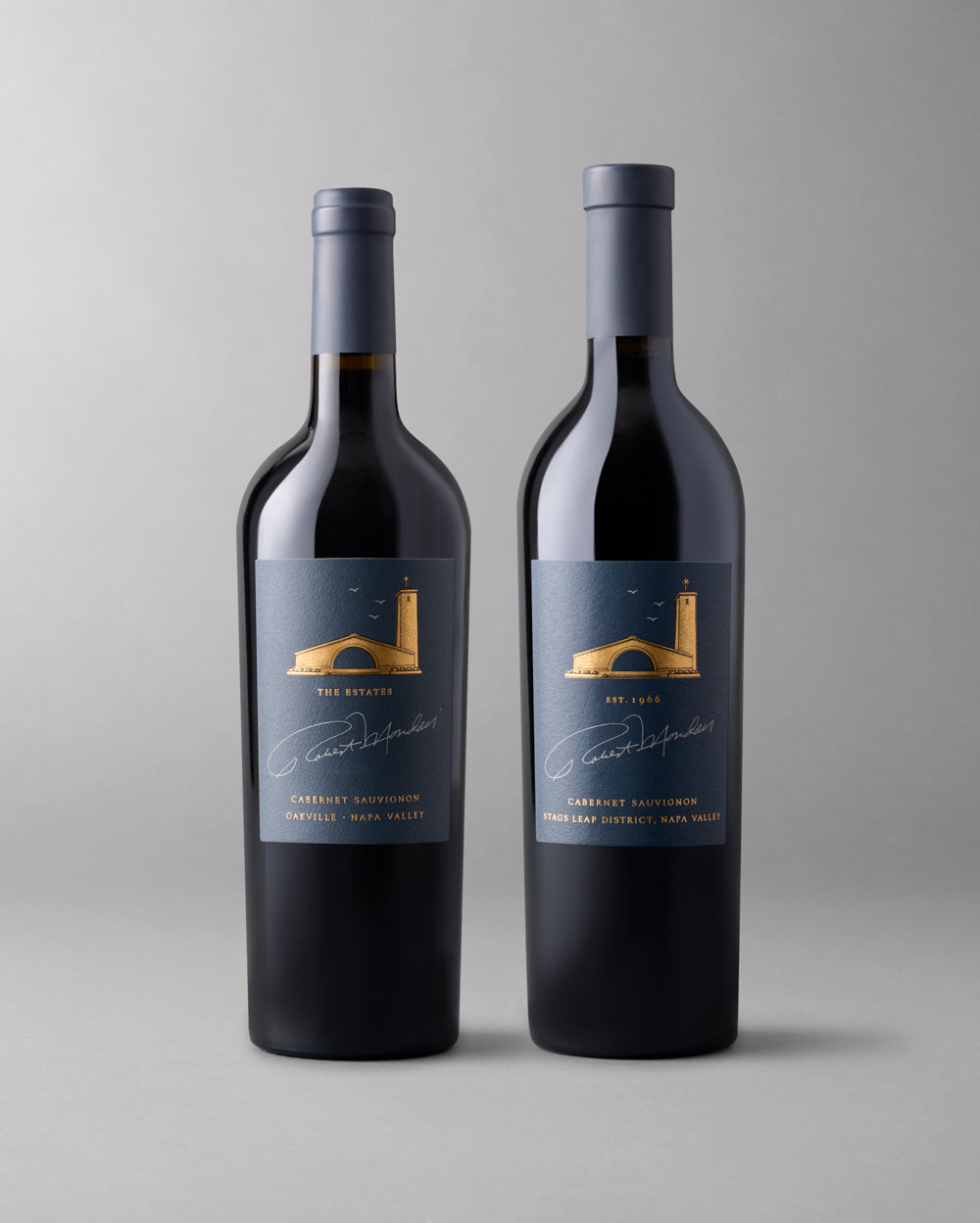 Two bottles of our Estates Cabernet Sauvignon: one from Oakville, the other Stag's Leap District