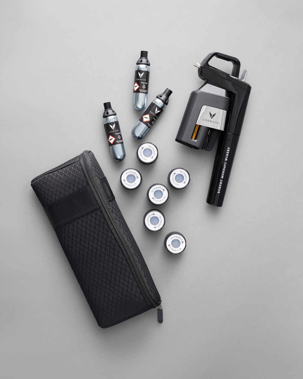 The Coravin Timeless Six+ with all accessories on a white background