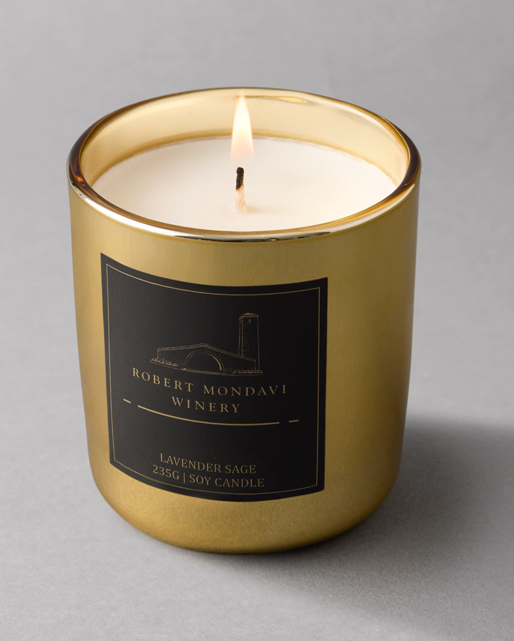 A handpoured Gold Vessel Candle Lavender and Sage aroma