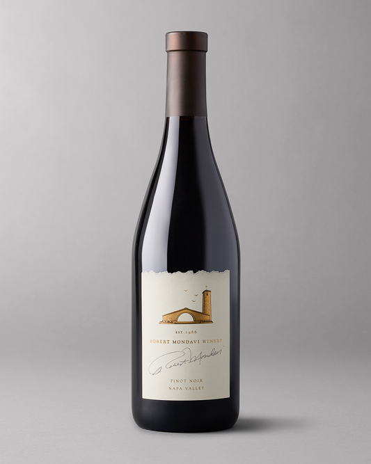 Bottle of Robert Mondavi Napa Valley Pinot Noir on a light grey background
