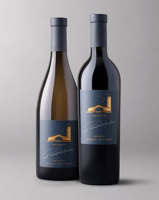 Bottles of Oakville Fume Blanc and Red Wine on a light grey background