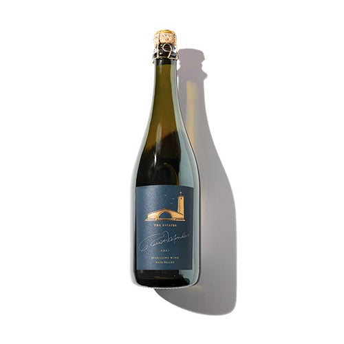 Single bottle of sparkling wine on white background